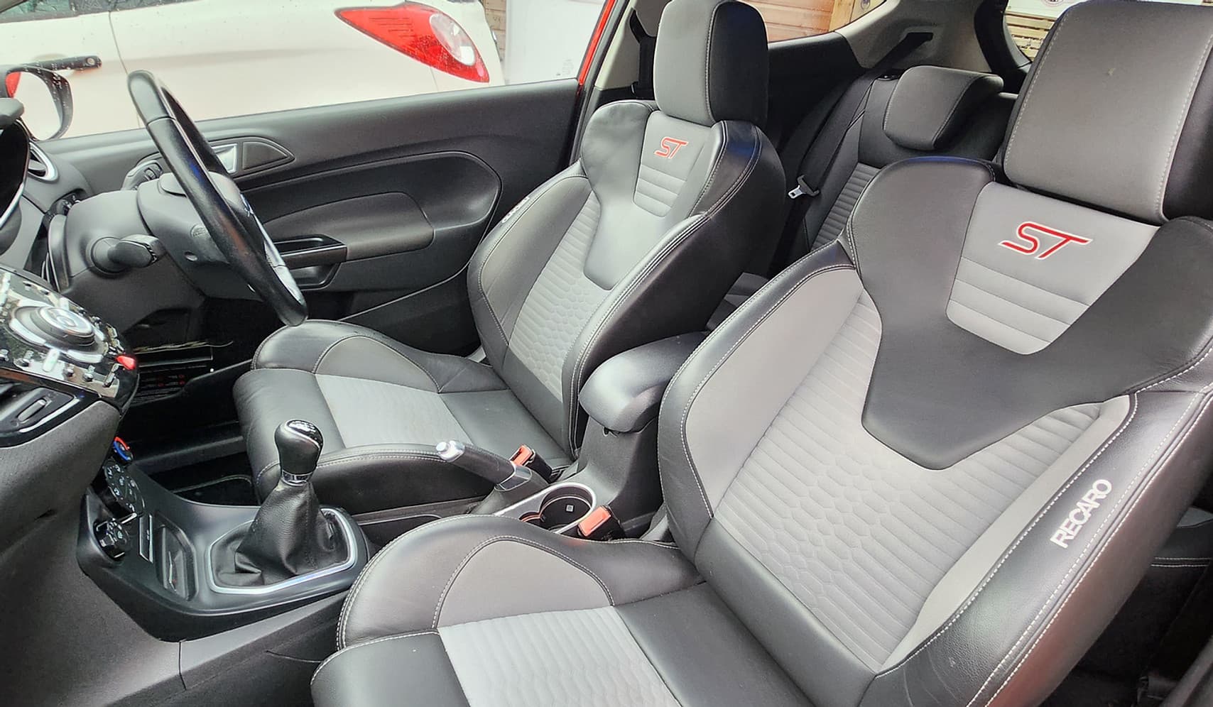 Dealer forecourt and garage from the source site